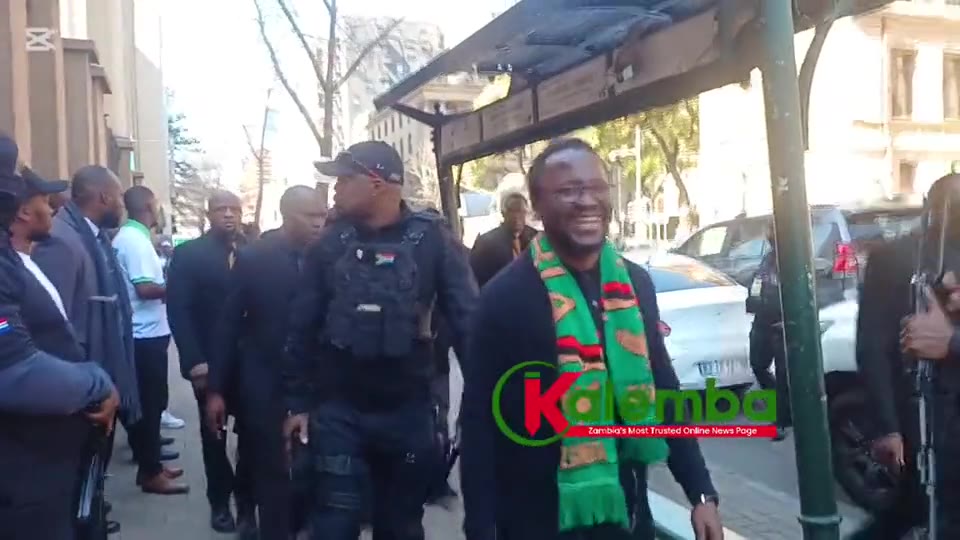 Escort movement during court proceedings — news footage (video)